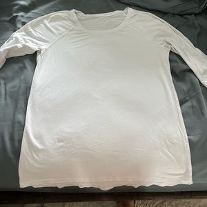 Lululemon long sleeve T-shirt white size between 4-6 good condition (loved)